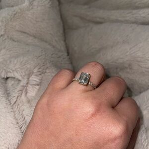 ISAAC WOLF 
Timeless emerald cut moissanite w/ half eternity
10K size 7